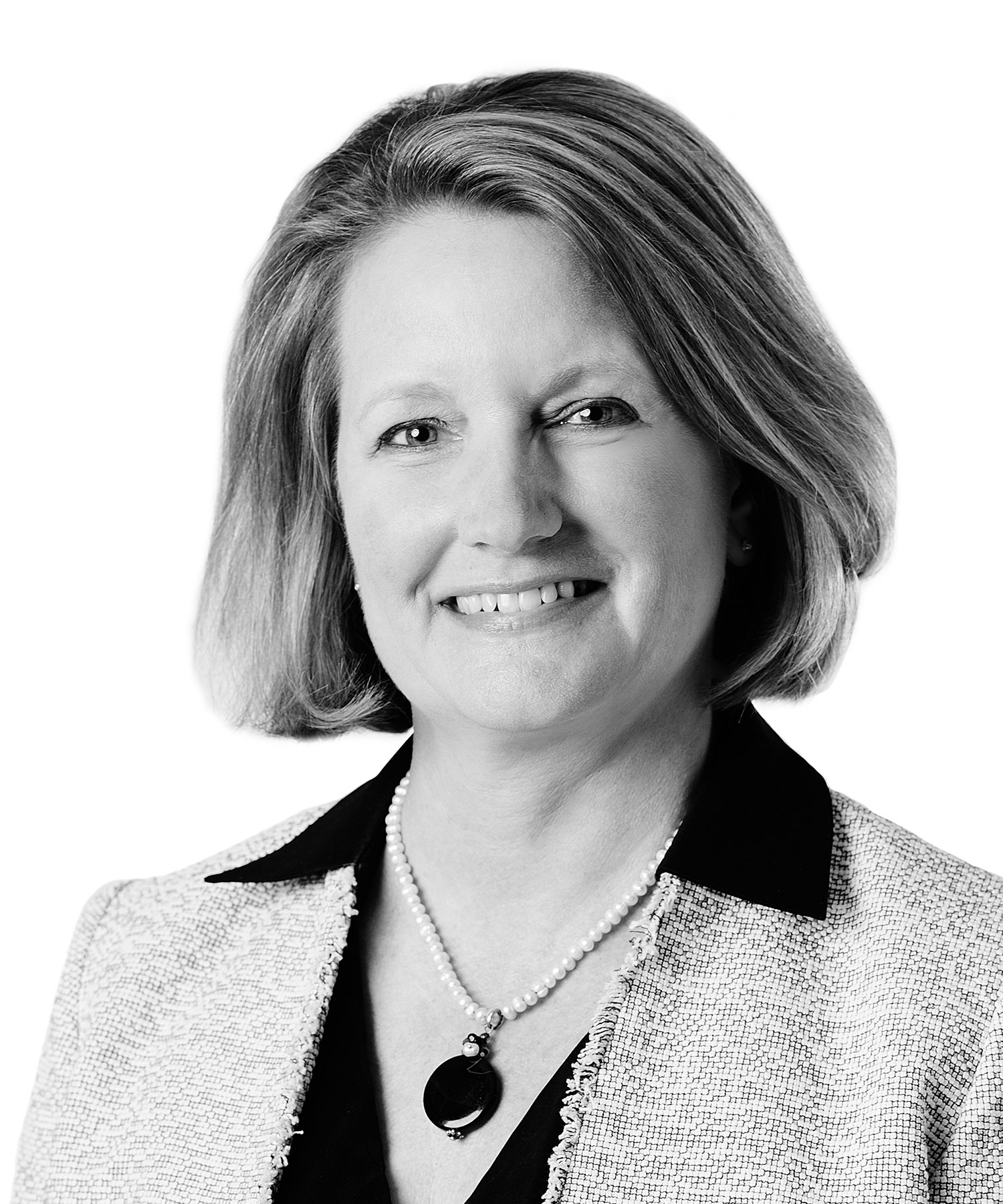 Rebecca Anderson, Director of Engagement and Communications at Sage Financial Group. Headshot photograph of Rebecca Anderson smiling and looking directly at the camera, wearing professional attire.