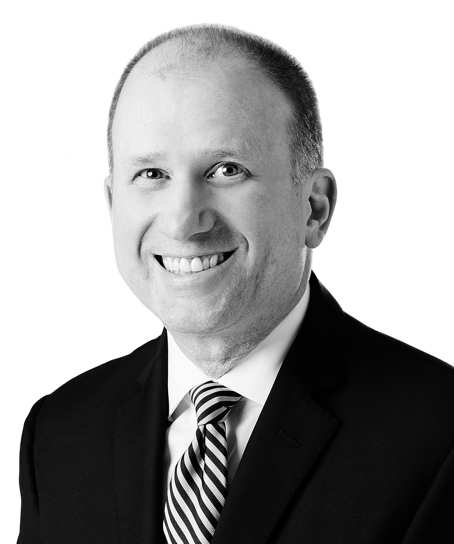 George Harris, CPA, Senior Wealth Manager at Sage Financial Group. Headshot photograph of George Harris, CPA smiling and looking directly at the camera, wearing professional attire.