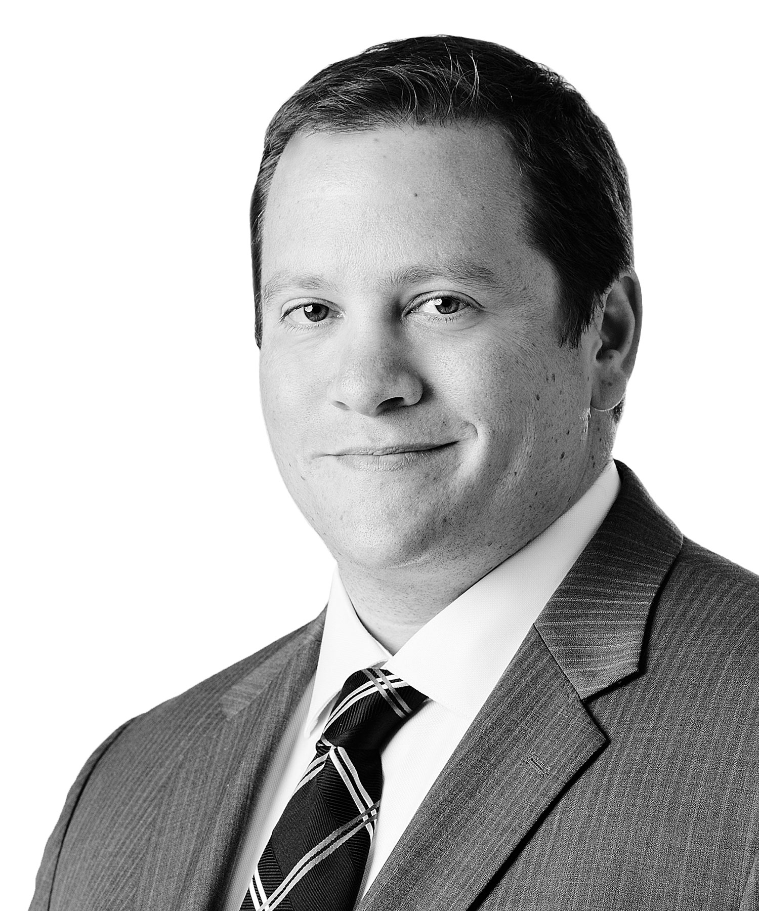 David Hulnick, Senior Manager, Information Technology at Sage Financial Group. Headshot photograph of David Hulnick smiling and looking directly at the camera, wearing professional attire.