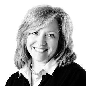 Mary Lieberman, Administrative Operations Manager at Sage Financial Group. Headshot photograph of Mary Lieberman smiling and looking directly at the camera, wearing professional attire.