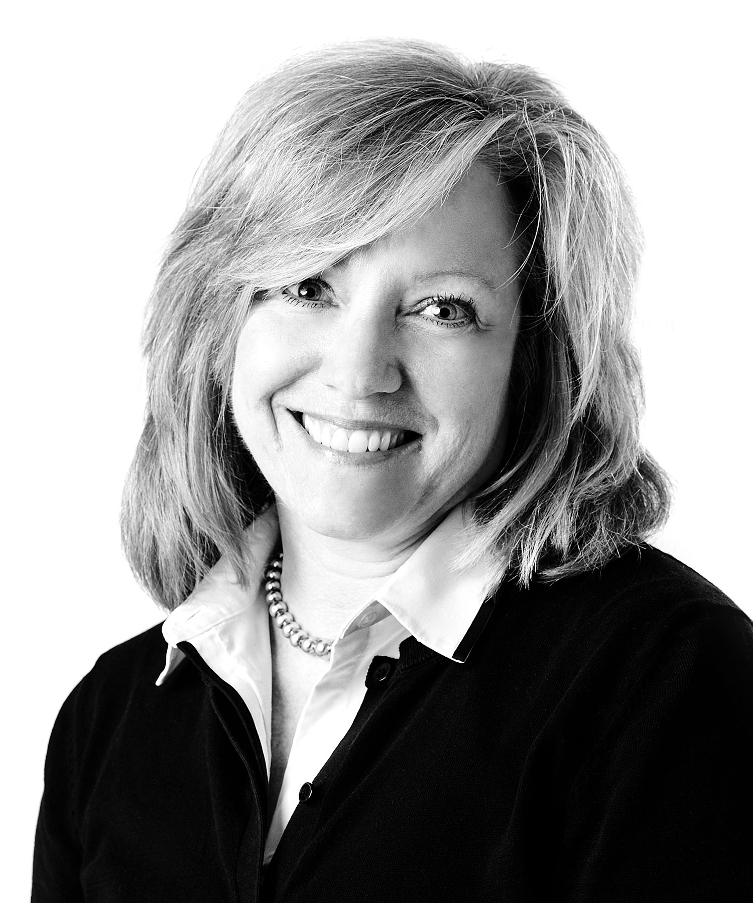 Mary Lieberman, Administrative Operations Manager at Sage Financial Group. Headshot photograph of Mary Lieberman smiling and looking directly at the camera, wearing professional attire.