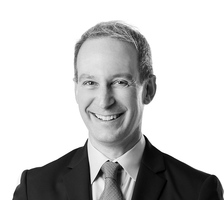 Benjamin Alimansky, MBA, Strategic Investment Consultant at Sage Financial Group. Headshot photograph of Benjamin Alimansky, MBA smiling and looking directly at the camera, wearing professional attire.